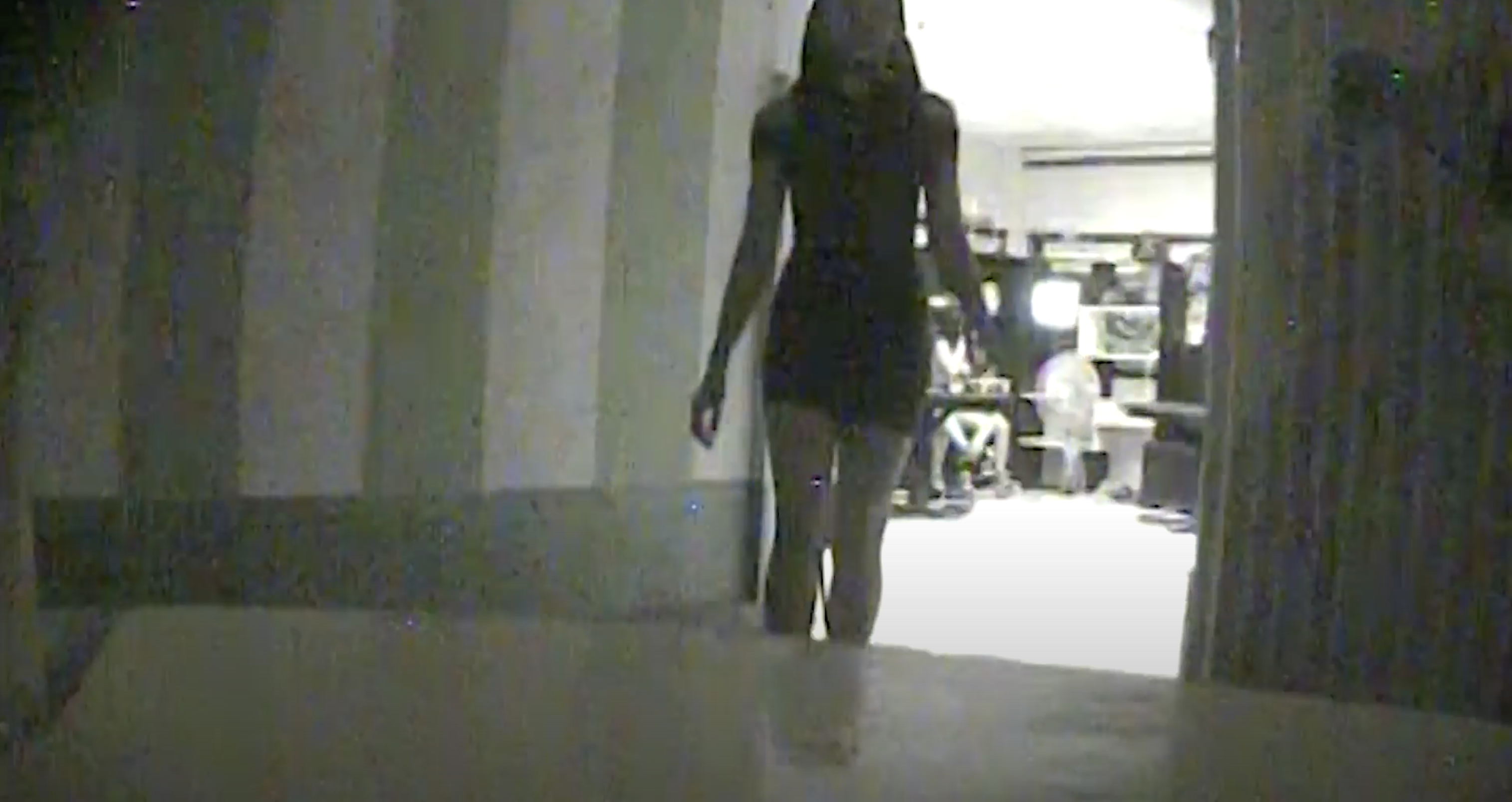 A female victim of human trafficking is captured on undercover footage as she walks into a room to meet with an undercover investigator.